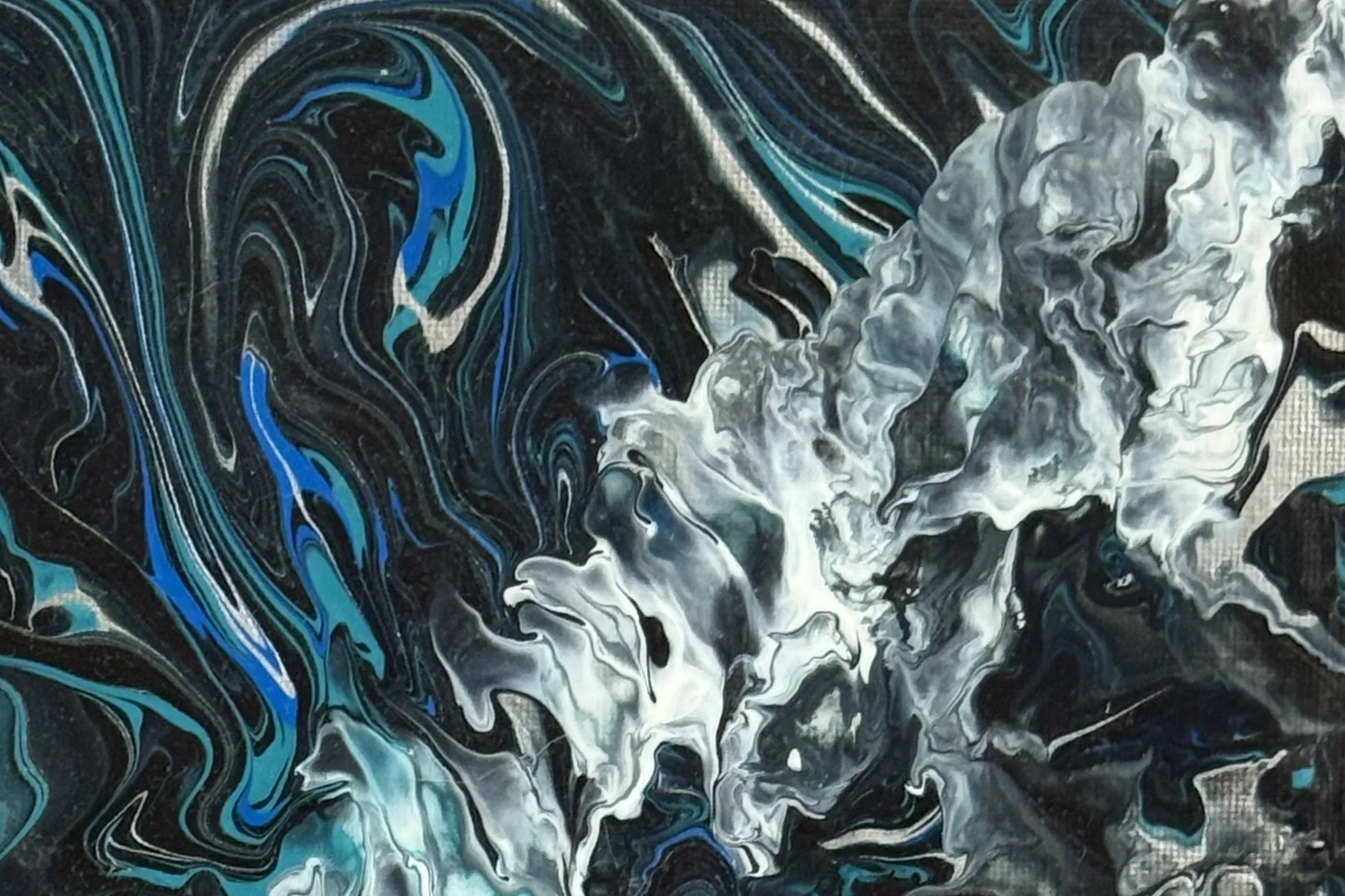 Macro detail of a fluid pour painting. On the left, cobalt and turquoise veins wind through wet black in long vertical ribbons. On the right they break into a billowing cliff of white and pale grey, ruffled and crested like surf, with the canvas weave showing through the thinnest paint.